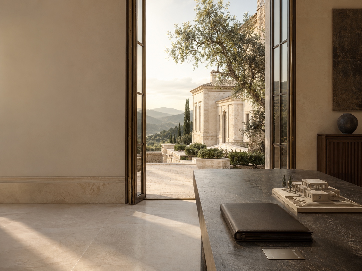 A private residence at dusk, with an architectural model set out on a stone table